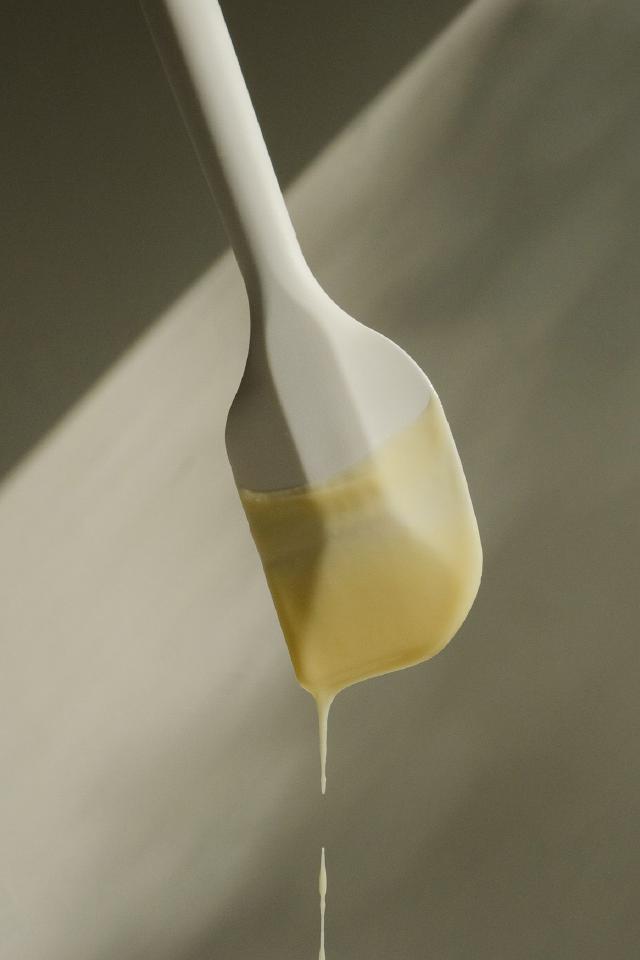 Delicious dough dropping of a spatula Delicious dough dropping of a spatula